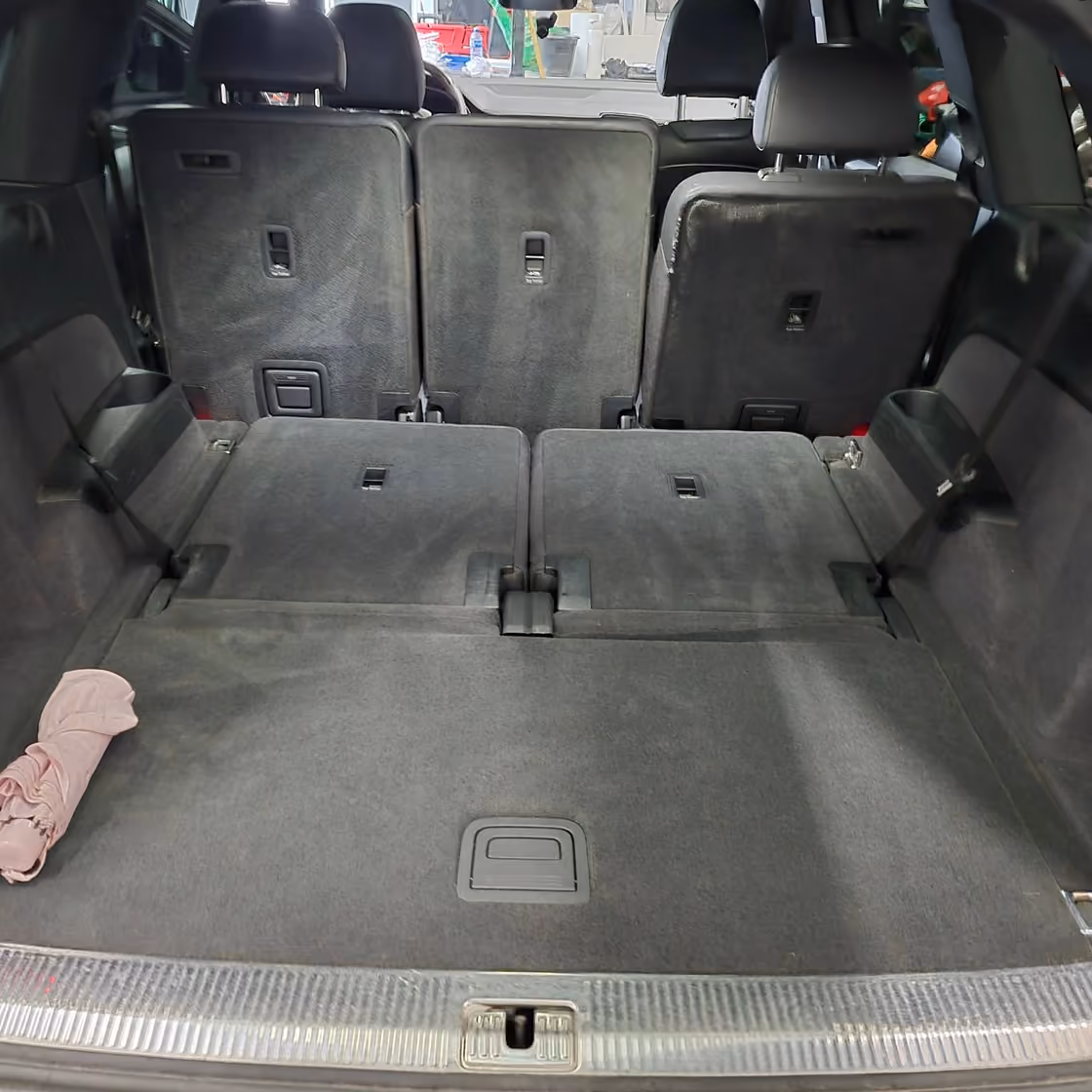 Cargo area vacuumed and cleaned, carpet looking even again